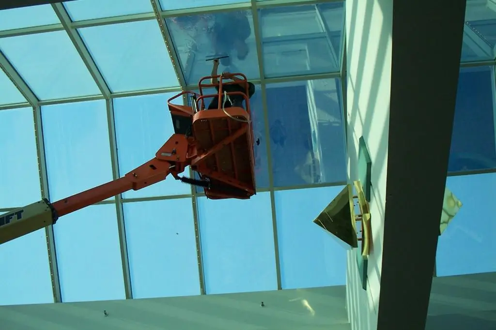 Professional window film installation on residential glass